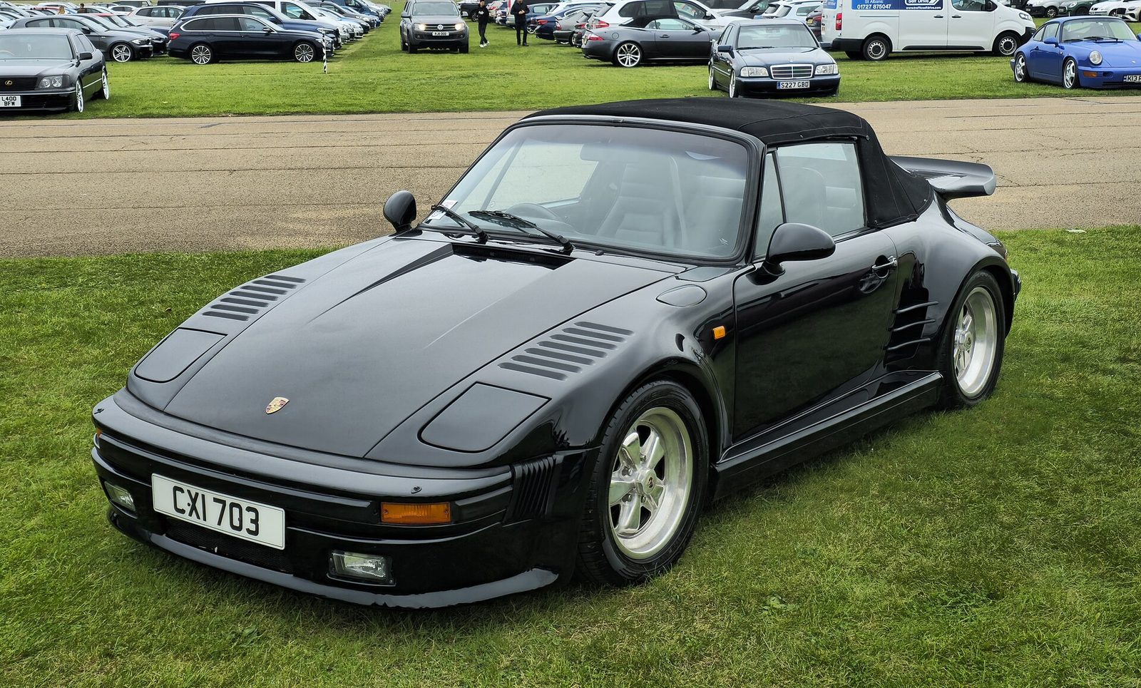 Black 1979 Porsche 911 930 Turbo cabriolet with slant-nose bodywork