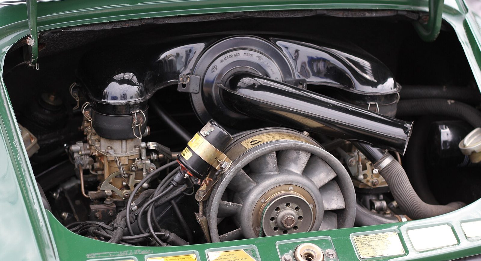 Engine bay of a 1971 Porsche 911 T with its air-cooled flat-six